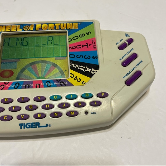 Tiger Wheel of Fortune Electronic Handheld game - Picture 4 of 10